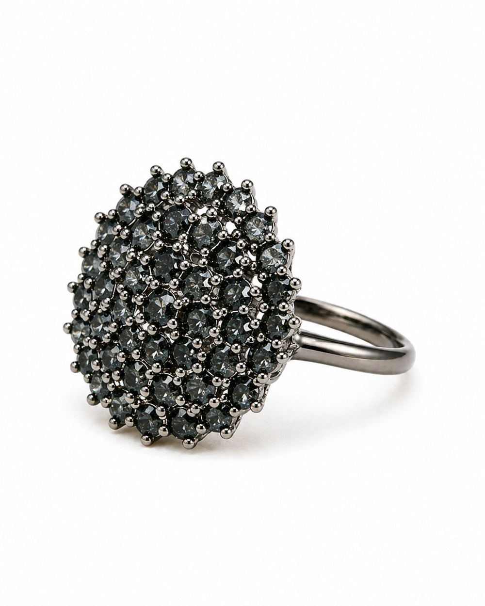 Silver ring with black gemstones on a white background