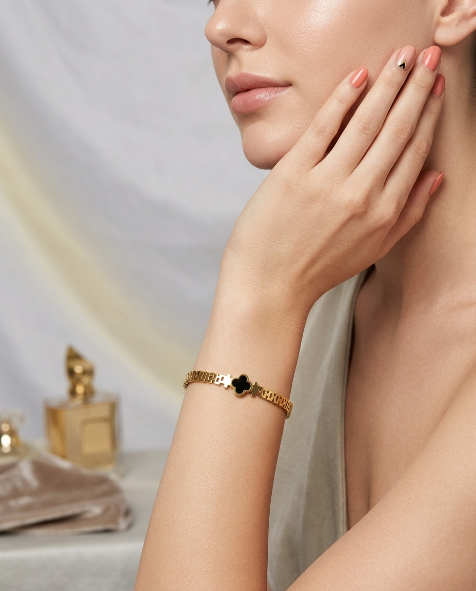 modal shoots wearing goldden bracelets. Noirvine bracelet