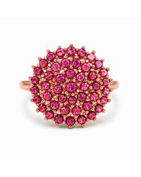 Ring with pink gemstones on a white background